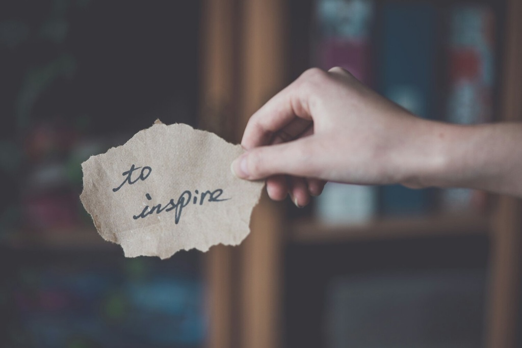 a therapist holding paper notes from a session with a client in West Palm Beach